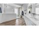 Bright bathroom features double sinks, modern vanity, and mirrored closet door showcasing the bedroom area at 945 E Playa Del Norte Dr # 4017, Tempe, AZ 85288