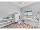 Bright bedroom with a bed with storage underneath, offering a view from the window and a cozy ambiance at 945 E Playa Del Norte Dr # 4017, Tempe, AZ 85288