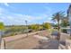 Exterior view of a lakeside walking path with trees and landscaping at 945 E Playa Del Norte Dr # 4017, Tempe, AZ 85288
