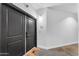 Secure building hallway leading to a private unit, with a cozy welcome mat and modern fixtures at 945 E Playa Del Norte Dr # 4017, Tempe, AZ 85288