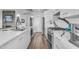 Modern kitchen with white cabinetry, stainless steel appliances, and granite countertops at 945 E Playa Del Norte Dr # 4017, Tempe, AZ 85288