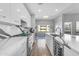 Well-lit kitchen with an island, stainless appliances, modern finishes, and views to the outdoors at 945 E Playa Del Norte Dr # 4017, Tempe, AZ 85288