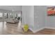 Bright living room featuring modern furnishings, wood floors, and a wall of windows with city views at 945 E Playa Del Norte Dr # 4017, Tempe, AZ 85288