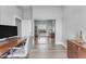 Office featuring a mirrored closet reflecting a bright workspace with sleek desk and modern office chair at 945 E Playa Del Norte Dr # 4017, Tempe, AZ 85288