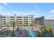 A view of the swimming pool from the upstairs balcony, with lake views at 945 E Playa Del Norte Dr # 4017, Tempe, AZ 85288