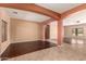 Open living area with hardwood floors and an abundance of natural light at 9625 W Prospector Dr, Queen Creek, AZ 85144
