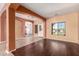 Open living area with hardwood floors and an abundance of natural light at 9625 W Prospector Dr, Queen Creek, AZ 85144