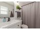 Well-lit bathroom featuring a white vanity, mirror, and decorative accents at 1029 E Marco Polo Rd, Phoenix, AZ 85024