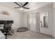 Office space with neutral tones, a desk, chair, and a large window at 1029 E Marco Polo Rd, Phoenix, AZ 85024