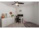 Cozy office space with a work area, decor, and a relaxing dog bed at 1029 E Marco Polo Rd, Phoenix, AZ 85024