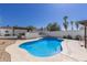 Backyard pool featuring a pergola and lounge chairs for outdoor relaxation and enjoyment at 1029 E Marco Polo Rd, Phoenix, AZ 85024