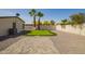 Landscaped backyard featuring a putting green, palm trees, a patio and desert foliage at 1064 S 97Th St, Mesa, AZ 85208