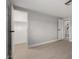 Bedroom featuring neutral walls, and a closet and bathroom entrance at 1064 S 97Th St, Mesa, AZ 85208