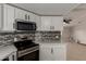 Modern kitchen features stainless steel microwave and oven at 1064 S 97Th St, Mesa, AZ 85208