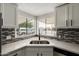 Kitchen with double sink and view of the outdoors at 1064 S 97Th St, Mesa, AZ 85208