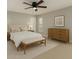 Serene main bedroom featuring neutral tones, ample natural light, and coordinating furniture at 1064 S 97Th St, Mesa, AZ 85208