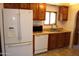 Functional kitchen equipped with modern appliances, wooden cabinets, and ample counter space at 11596 W Sierra Dawn Blvd # 286, Surprise, AZ 85378