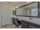 Bright bathroom features dual sinks, vanity, large mirror, and walk-in glass shower at 1197 W Fir Tree Rd, Queen Creek, AZ 85140