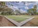 Scenic community bocce ball courts surrounded by greenery and blue skies at 1197 W Fir Tree Rd, Queen Creek, AZ 85140