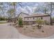 Community center featuring desert landscaping, stone accents, and a tile roof at 1197 W Fir Tree Rd, Queen Creek, AZ 85140