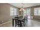 Inviting dining area featuring a sliding glass door leading to outdoor space at 1197 W Fir Tree Rd, Queen Creek, AZ 85140