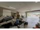 Spacious two-car garage with ample storage space and garage door open to front at 1197 W Fir Tree Rd, Queen Creek, AZ 85140