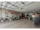 Spacious two-car garage with ample storage and shelving, suitable for multiple vehicles at 1197 W Fir Tree Rd, Queen Creek, AZ 85140