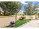 Backyard fountain feature with lush landscaping at 13051 W Black Hill Rd, Peoria, AZ 85383