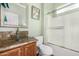 Updated bathroom features glass bowl sink, granite counters, and glass enclosed shower at 13051 W Black Hill Rd, Peoria, AZ 85383