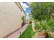 Landscaped pathway along the side of the house at 13051 W Black Hill Rd, Peoria, AZ 85383