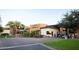 Charming building exterior, showcasing a golf course, desert landscaping and golf carts at 13051 W Black Hill Rd, Peoria, AZ 85383