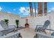 Backyard seating area with a cozy chiminea, perfect for enjoying cool evenings at 1307 E Encanto St, Mesa, AZ 85203