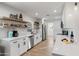 Bright kitchen with modern cabinets, open shelving, and stainless steel appliances at 1307 E Encanto St, Mesa, AZ 85203