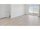 Bright living room with tile floors and access to the backyard through sliding glass doors at 1331 W Hess Ave, Coolidge, AZ 85128