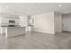 Open concept living space featuring neutral color palette, tile floors and recessed lighting at 1343 W Hess Ave, Coolidge, AZ 85128