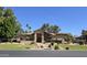Inviting single-level home with desert landscaping and a cozy front yard at 1348 E Los Arboles Dr, Tempe, AZ 85284