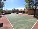 Enjoy outdoor activities with this tennis court, pool, and patio in a well-manicured backyard at 1348 E Los Arboles Dr, Tempe, AZ 85284