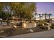 Beautifully landscaped home exterior with charming curb appeal and desert landscaping at 13631 N Canterbury Dr, Phoenix, AZ 85023
