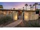 Inviting home facade with an arched gate, desert landscaping, and clear address numbers at 13631 N Canterbury Dr, Phoenix, AZ 85023