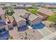 Aerial view of a home in a desert landscape, featuring a tile roof at 1385 E Martha Dr, Casa Grande, AZ 85122