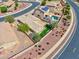 Aerial view of a home and community featuring a tile roof at 1385 E Martha Dr, Casa Grande, AZ 85122