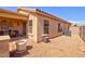 Low maintenance backyard showcasing a covered patio perfect for outdoor dining and relaxation at 1385 E Martha Dr, Casa Grande, AZ 85122