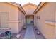 Inviting entryway with a charming green front door and decorative cacti at 1385 E Martha Dr, Casa Grande, AZ 85122