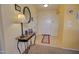 Welcoming foyer features a marble-topped console table and decorative mirror at 1385 E Martha Dr, Casa Grande, AZ 85122