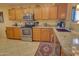 Well-appointed kitchen featuring stainless steel appliances and granite countertops at 1385 E Martha Dr, Casa Grande, AZ 85122