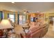 Comfortable living room with a media center and access to the outdoor patio at 1385 E Martha Dr, Casa Grande, AZ 85122