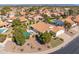 Aerial view of neighborhood homes with a stunning backyard pool and well-maintained landscaping at 14241 N 56Th Pl, Scottsdale, AZ 85254