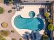 Aerial shot of a private backyard oasis with pool, spa, and outdoor dining area at 14241 N 56Th Pl, Scottsdale, AZ 85254