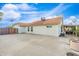 Backyard featuring a patio area with an attached covered porch and simple landscaping at 14241 N 56Th Pl, Scottsdale, AZ 85254