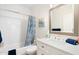 Bright bathroom features a shower-tub combo, white vanity, and is perfect for everyday routines at 14241 N 56Th Pl, Scottsdale, AZ 85254